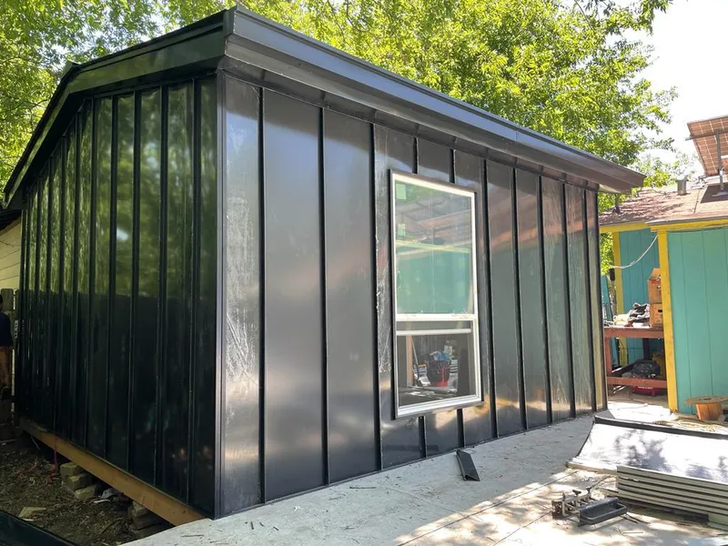 Black standing seam metal wall panels for Roof Inspection in Paterson